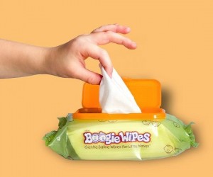 hand taking Boogie Wipes out of container