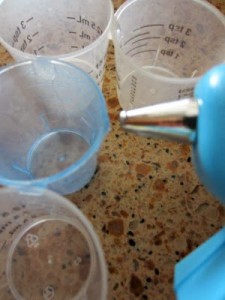 Hot gluing medicine cups
