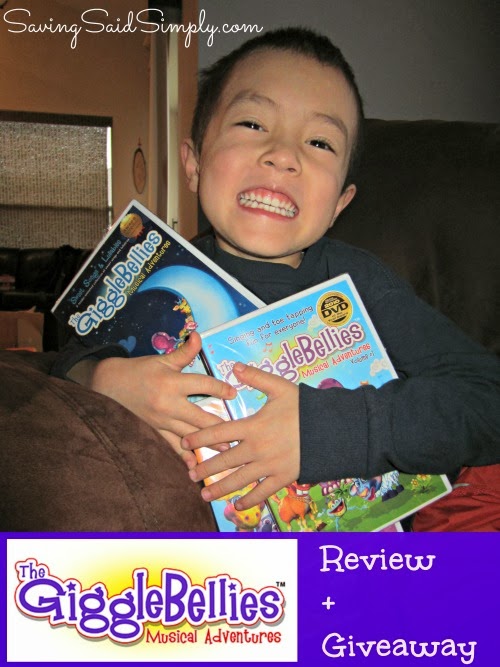 Boy holding GiggleBellies DVDs