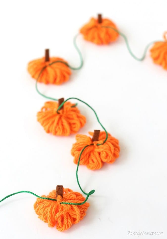 10 Pumpkin Kids Crafts for Fall - Raising Whasians Pumpkin yarn necklace
