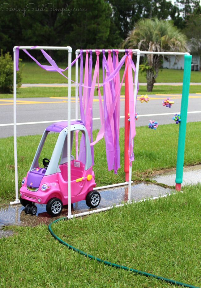 DIY Kid Car Wash | Step2 Easy Turn Coupe Review - Make your own Easy DIY Toddler Car Wash featuring PVC pipes for a fun summer kids activity. Full tutorial, directions & more. Perfect budget water play idea - #DIY #SummerFun #WaterPlay #FunForKids