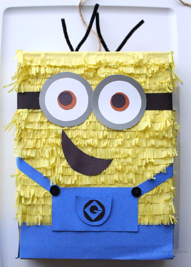 DIY minions pinata DIY Minion Pinata | Great ready for the new Minions Movie with this easy DIY Minions Pinata! Frugal Despicable Me party idea for the kids #PartyPlanning #Minions #KidsParty