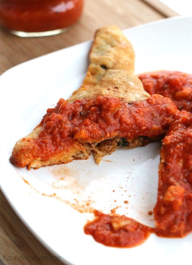 Spinach and Artichoke Calzones with Sausage Recipe | make this unique twist on an Italian pizza classic! These homemade calzones are delicious and easy #Recipe #Calzone #EasyRecipe