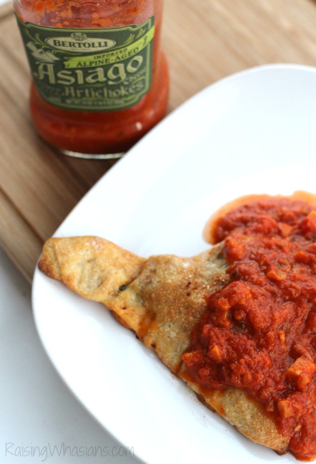 Spinach and Artichoke Calzones with Sausage Recipe | make this unique twist on an Italian pizza classic! These homemade calzones are delicious and easy #Recipe #Calzone #EasyRecipe