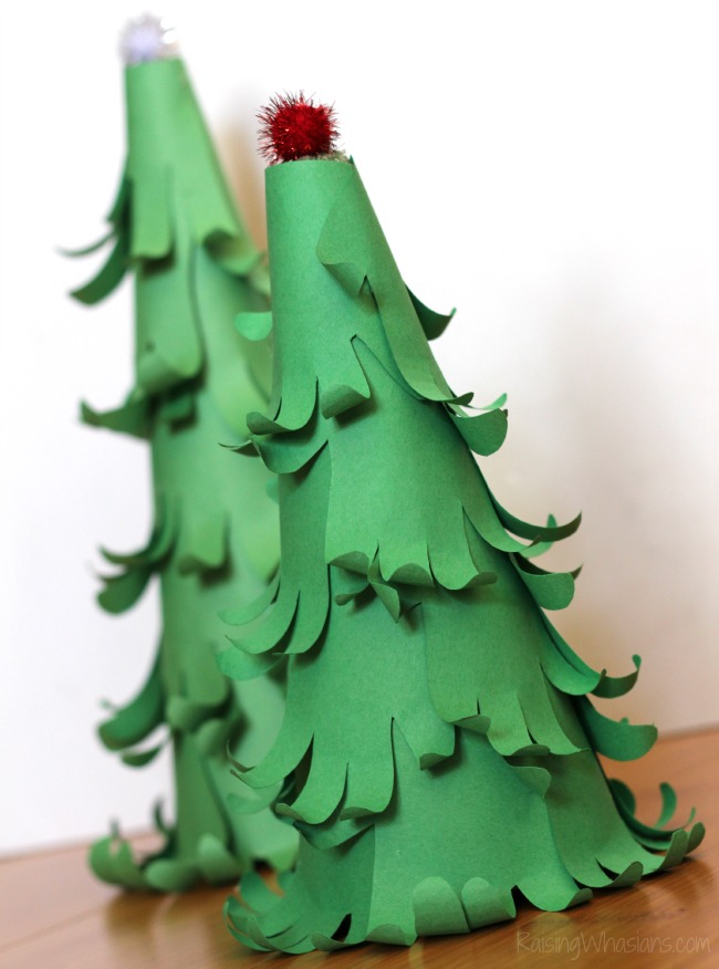Easy 3D Handprint Christmas Tree Craft | Make a unique and adorable holiday keepsake with this handprint inspired easy Christmas craft for your kids - #Christmas #Craft #DIY #KidsCraft