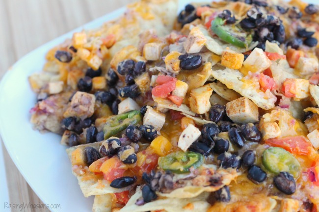 Loaded nachos vegetarian Loaded Vegetarian Nachos Recipe | Easy to make and protein packed Vegetarian Nachos Recipe, perfect for game day! Smoky Chipotle flavor with Nasoya Tofu #Recipe #GameDayRecipe #VegetarianRecipe 
