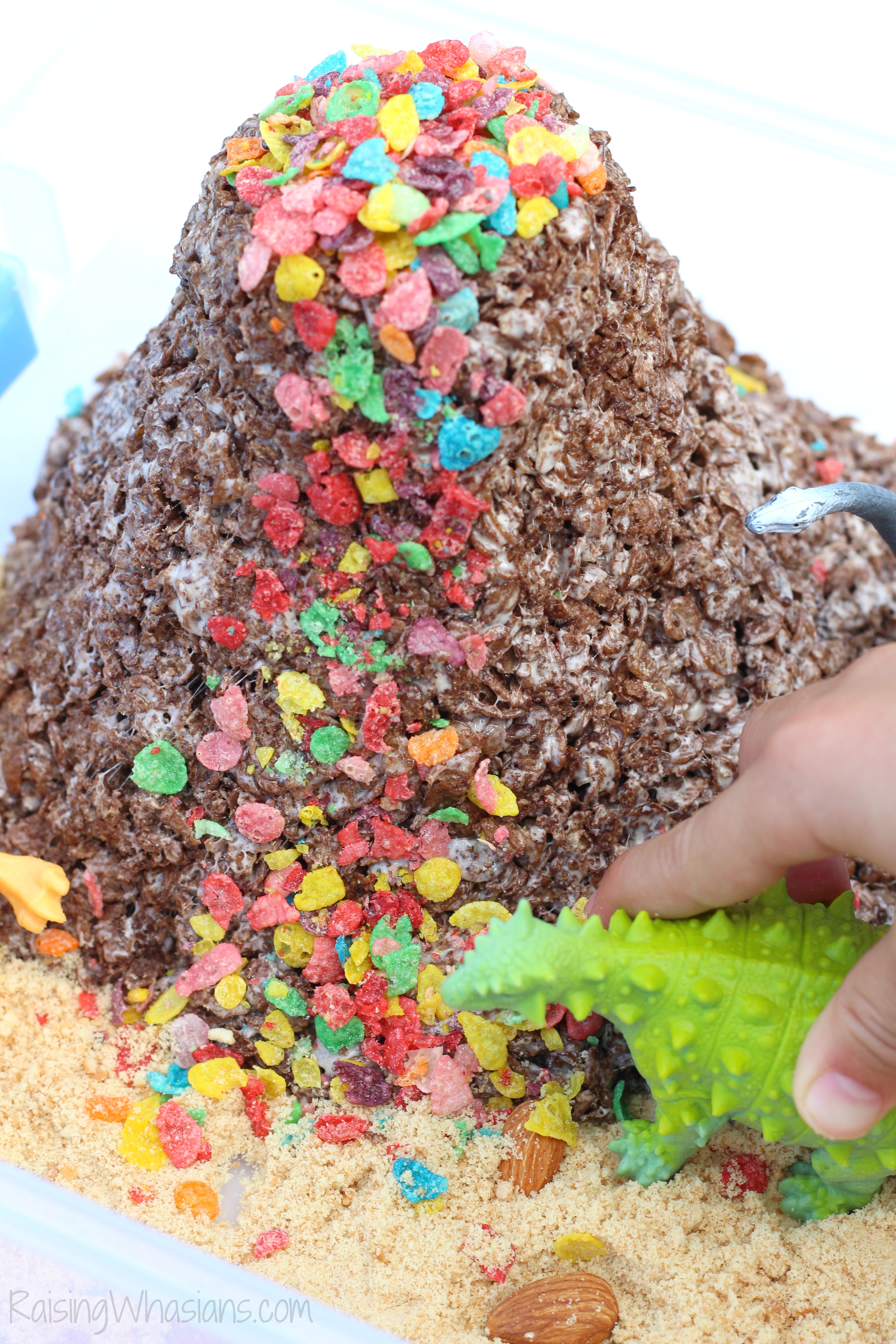 Dinosaur Sensory Bin with Edible Volcano Raising Whasians