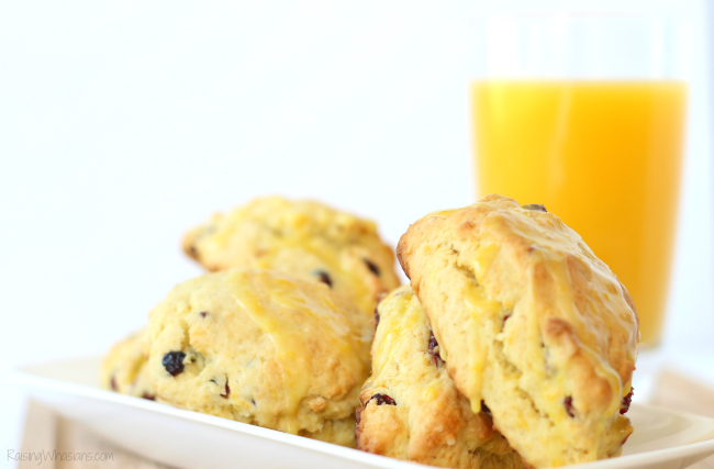 Easy Cranberry Scones with Simply Orange Glaze | Make this easy scone recipe with orange zest & cranberries - topped with sweet Simply Orange Low Acid Glaze #Recipe #Breakfast #Dessert 