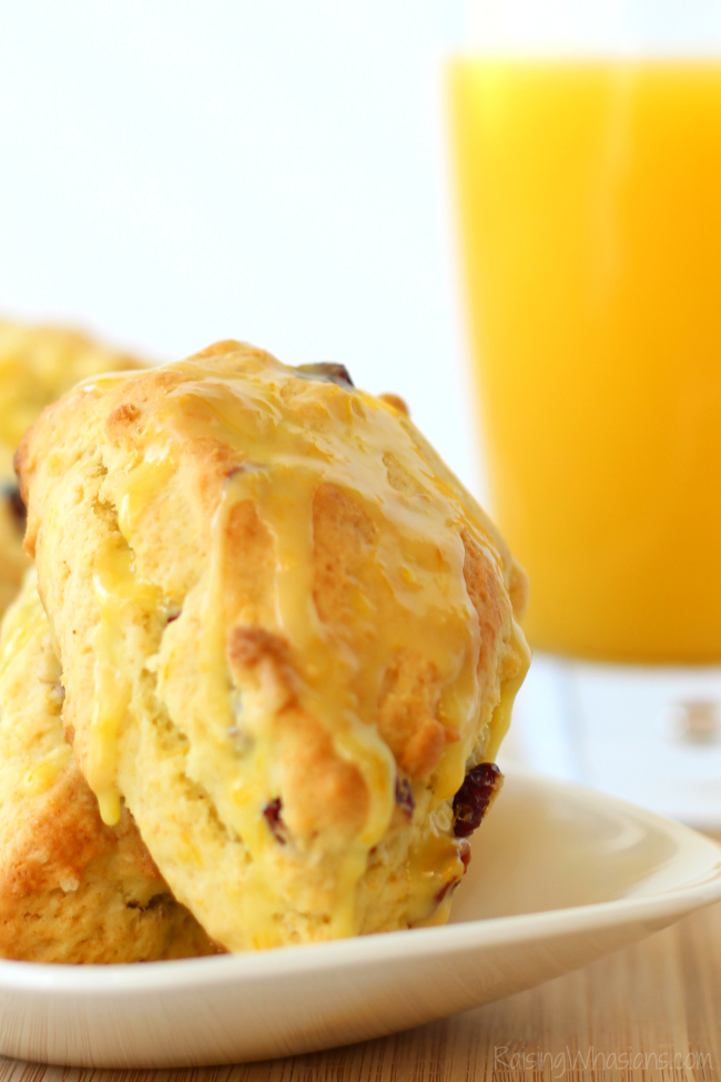 Easy Cranberry Scones with Simply Orange Glaze | Make this easy scone recipe with orange zest & cranberries - topped with sweet Simply Orange Low Acid Glaze #Recipe #Breakfast #Dessert 