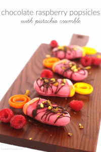 Chocolate raspberry popsicles with pistachio crumble
