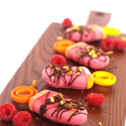 Chocolate raspberry popsicles with pistachio crumble