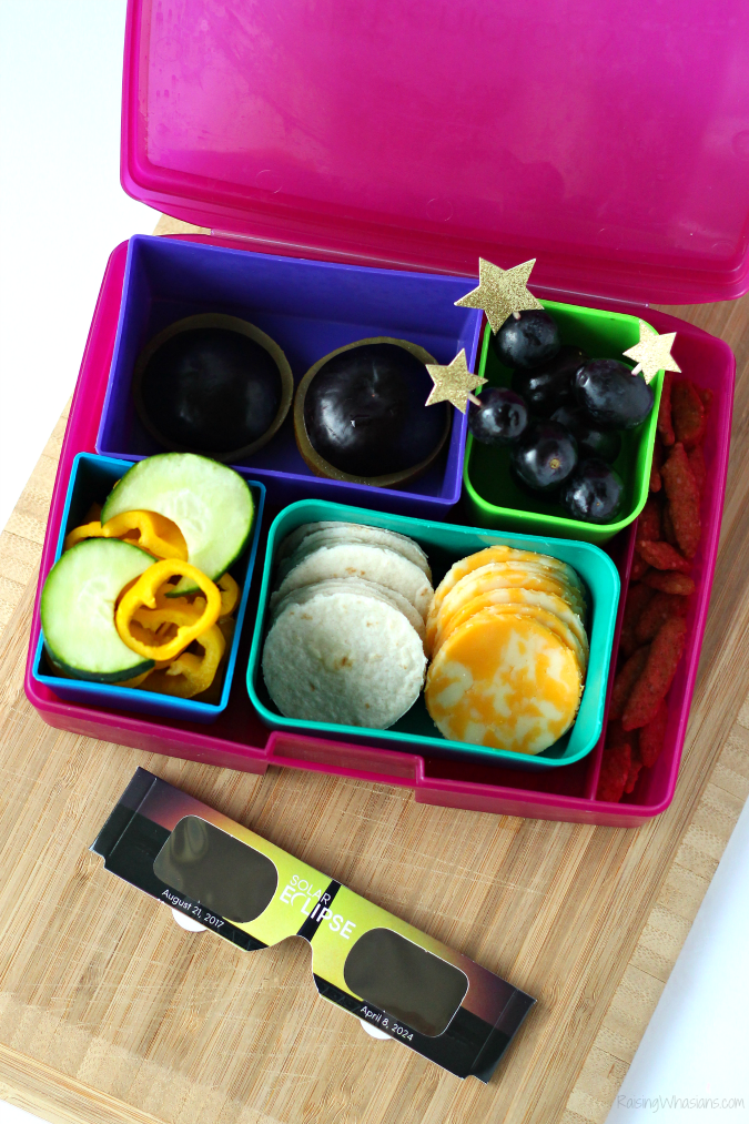 Solar Eclipse Bento Box Ideas - Raising Whasians Head Back-to-School with these delicious, healthy & fun Solar Eclipse Bento Box Ideas for kids lunches + give back with the Power Your Lunchbox Pledge #Recipe #lunchbox #lunchrecipe #bentobox #BacktoSchool