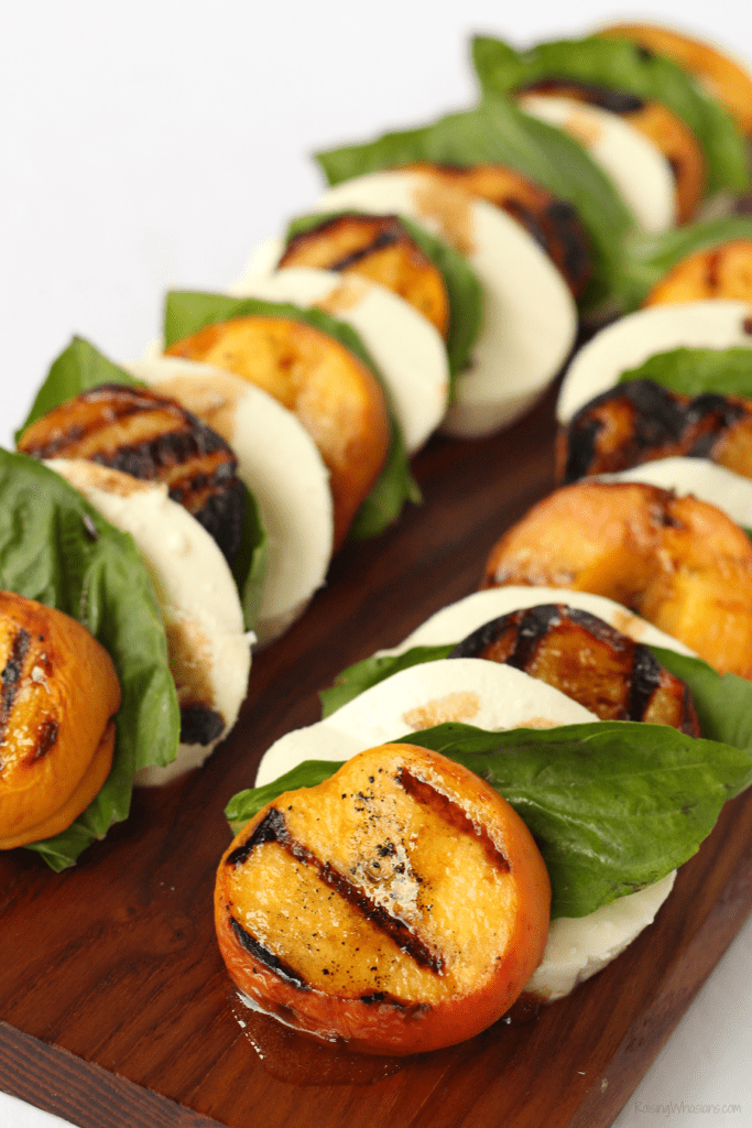 Easy peach salad idea Grilled Peach Caprese Salad with Easy Key Lime Vinaigrette | Florida flavor inspired idea with homemade dressing. Made with a secret ingredient, FL peaches! #Recipe #Salad #HealthyRecipe