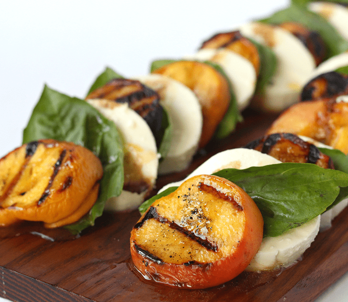 Grilled peach caprese salad