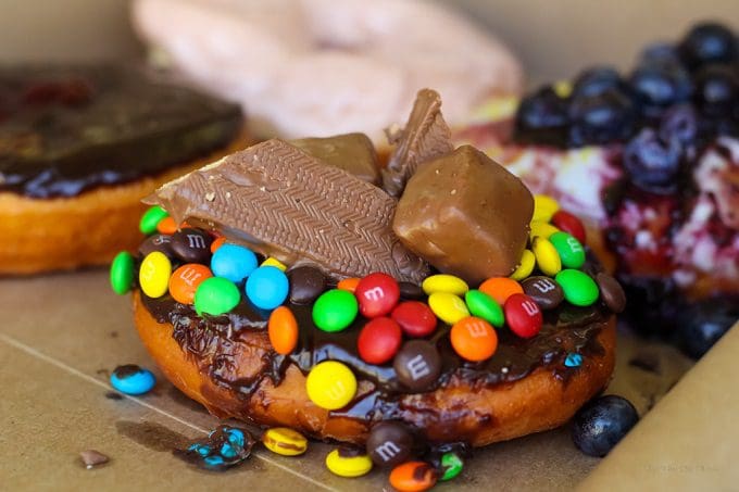 7 New Epcot Food and Wine Festival Booths Worth Drooling Over in 2021 - Raising Whasians Epcot food and wine festival candy bar donut